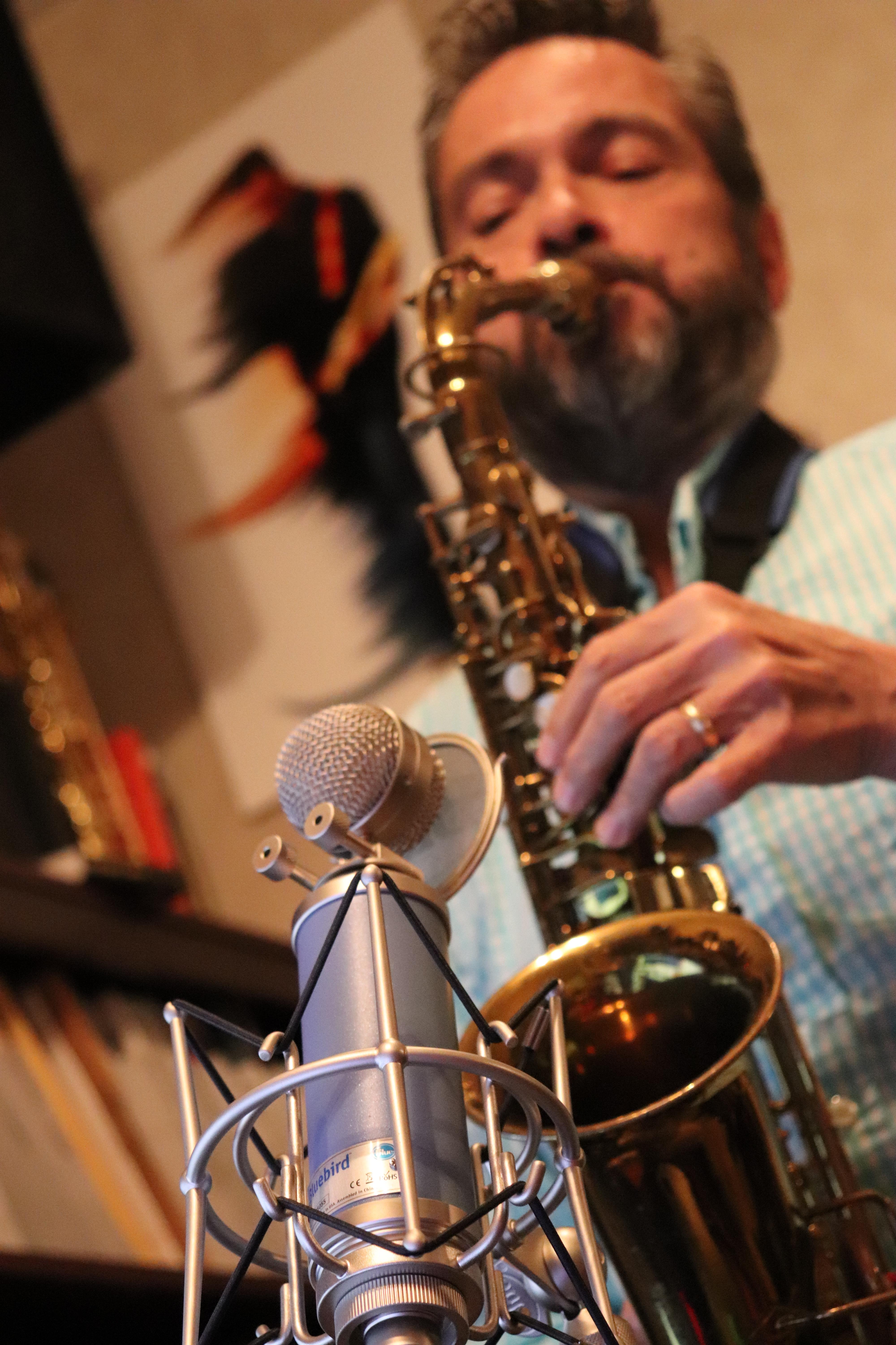 Mark Black playing saxophone